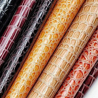 Warmverkauf PVC glänzendes, hochglänzendes, synthetisches Leder, geprägtes Steinmuster für Schuhe, Taschen, Notizbücher, Möbel